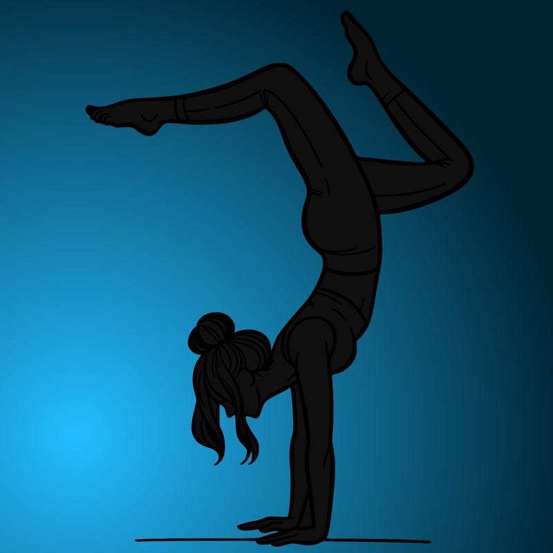 a woman doing a handstand