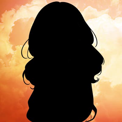 shy pretty girl wearing a sweater that is falling off one shoulder portrait