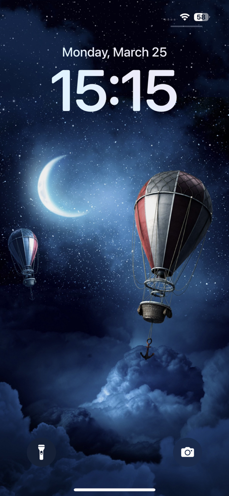 Wallpapers for phone & themes - iPhone lock screen featuring hot air balloons and a crescent moon in a starry night sky