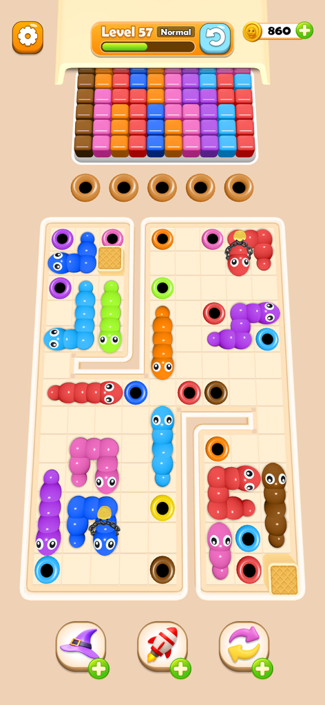 Worm Color Blast - Worm Color Blast gameplay showing colorful worms and matching color holes on a puzzle board