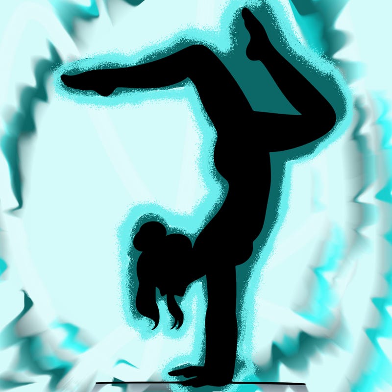 a woman doing a handstand