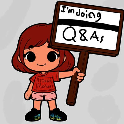 girl holding a big sign