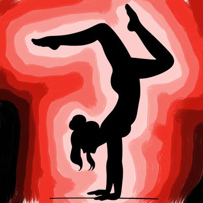 a woman doing a handstand