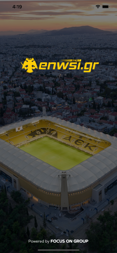 Enwsi.gr app splash screen showing AEK Athens soccer stadium and logo