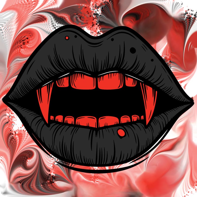 lips with vampire teeth