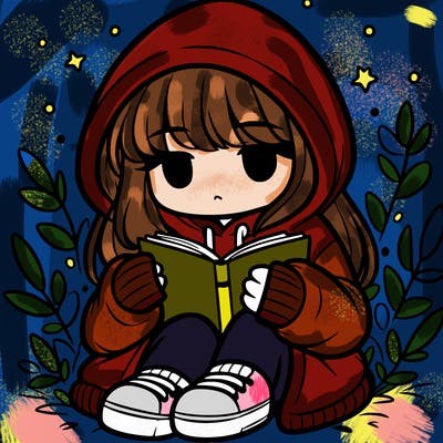 girl in oversized hoodie reading a book