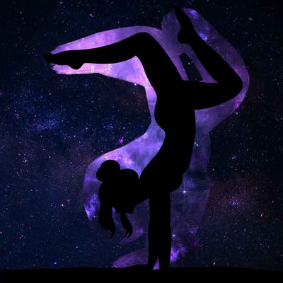 a woman doing a handstand