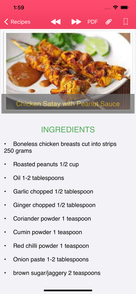 Healthy Food Recipes - Yummy - Ein mobiler App-Bildschirm, der die Zutatenliste und ein Foto von Hähnchen-Satay mit Erdnusssauce zeigt.