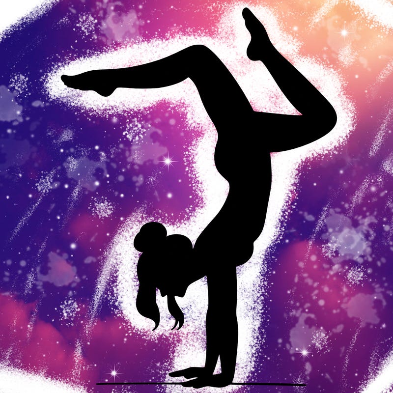 a woman doing a handstand