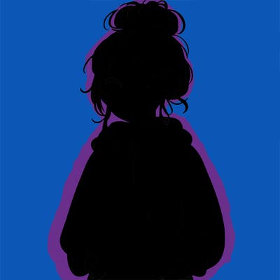 teen girl with a messy bun and glasses wearing a loose hoodie and jeans