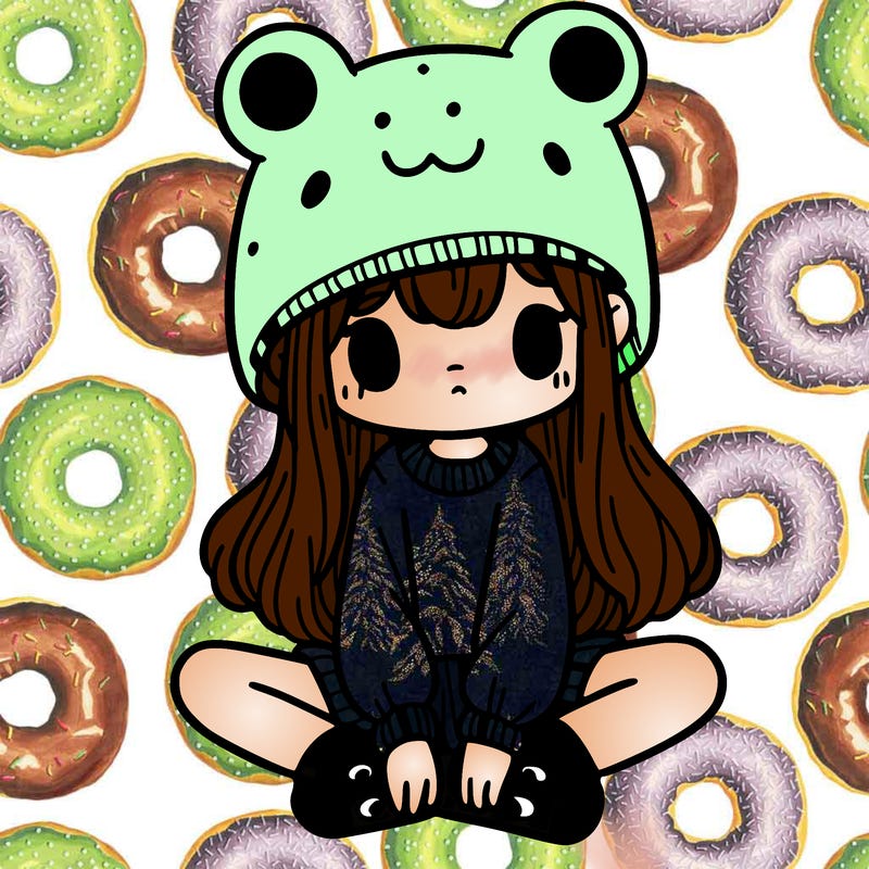 a girl wearing a frog hat and some frog socks