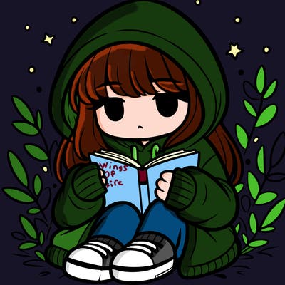 girl in oversized hoodie reading a book