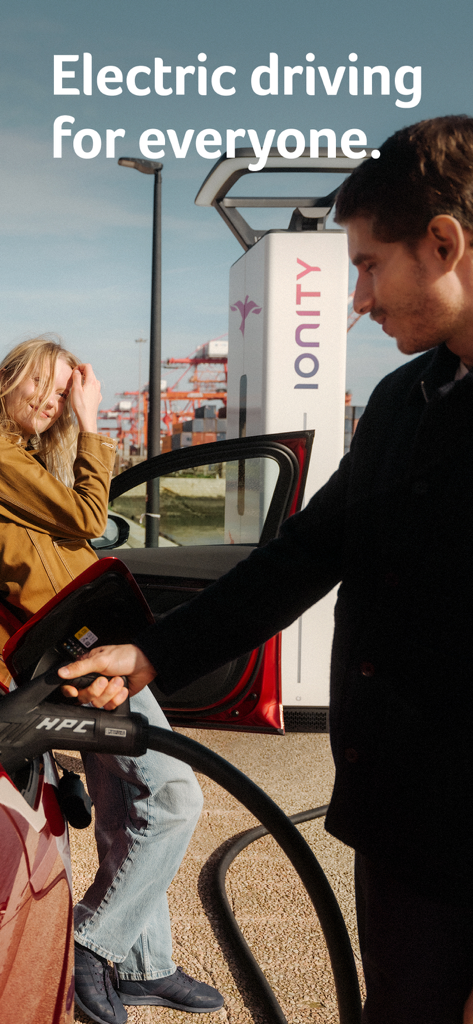 A man and woman charging an electric car at an IONITY high power charging station