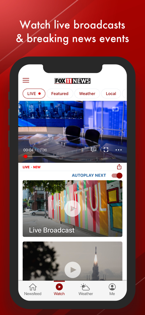 Interface of the WLUK FOX 11 news app displaying a live broadcast video player and news clips