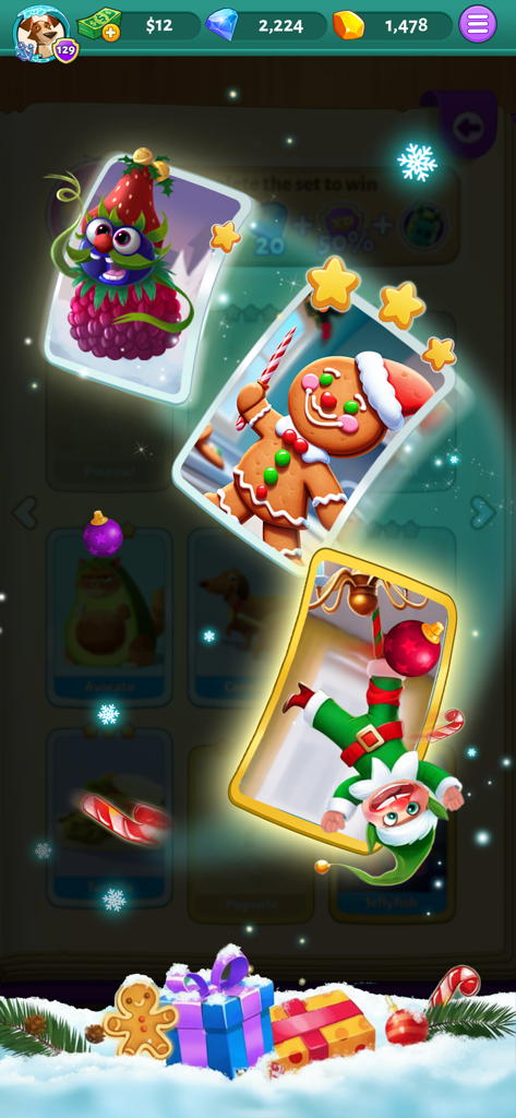Solitaire Cash - Écran de jeu Solitaire Cash montrant des cartes à collectionner festives sur le thème des fêtes, y compris un bonhomme en pain d'épice et un elfe