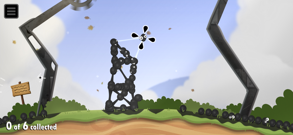 World of Goo 2 - Bolas de Goo negras formando una torre estructural en un nivel de puzzle de física de World of Goo 2.