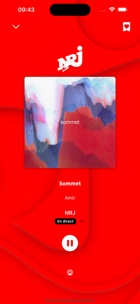 NRJ Belgique - AmirのSommetを再生中のNRJベルギーアプリのライブラジオプレーヤーインターフェイス。