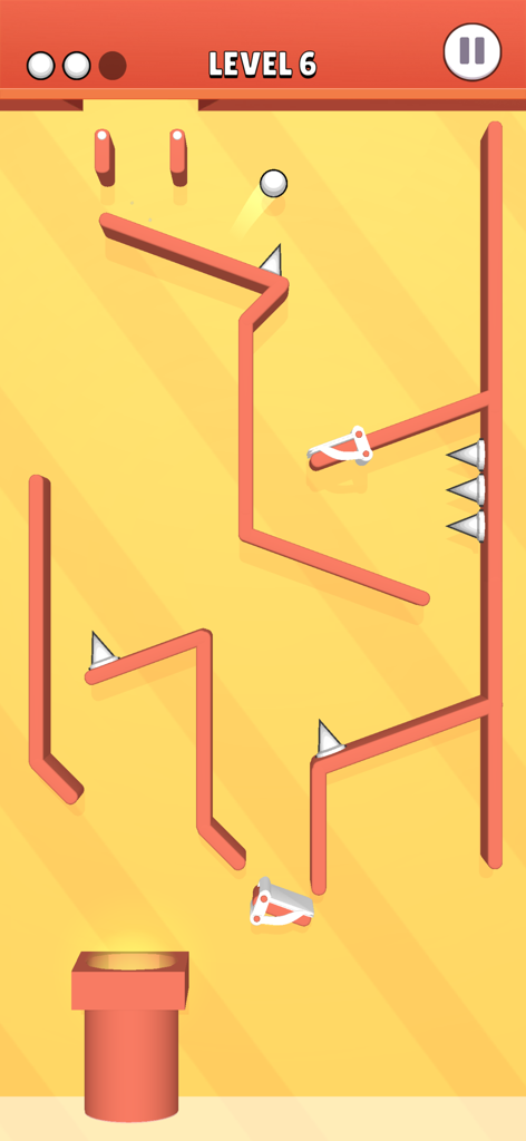 Balls Factory! - A white ball rolling through an orange maze with spikes in the game Balls Factory