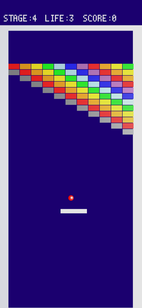 Breaking blocks in memory - Retro brick breaker gameplay with a white paddle red ball and rainbow colored blocks