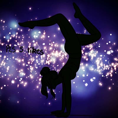a woman doing a handstand