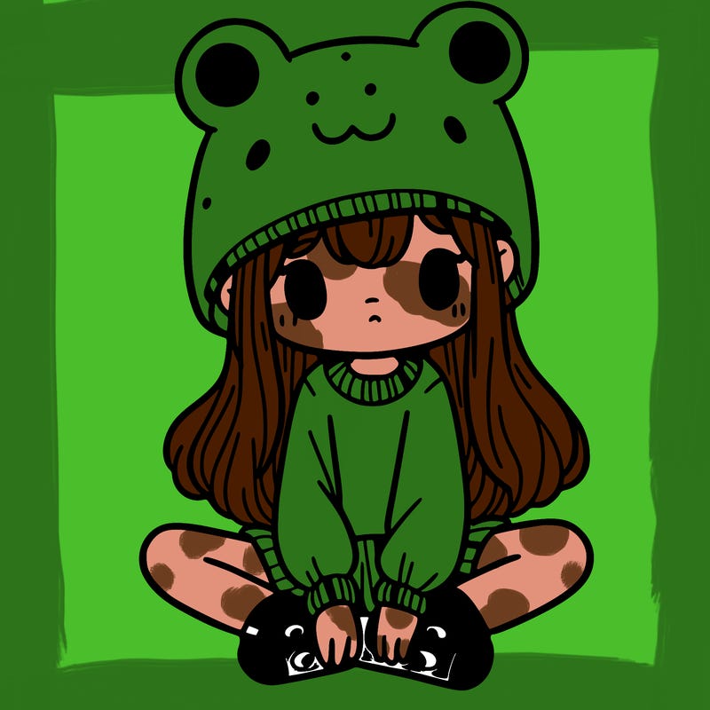 a girl wearing a frog hat and some frog socks