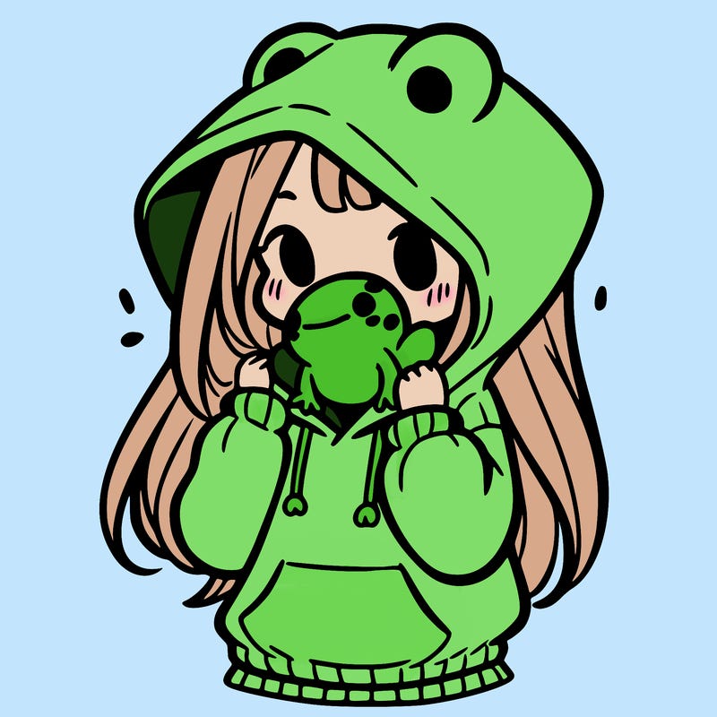 a girl holding a froggy hoodie