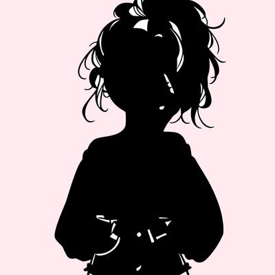 girl with a messy ponytail glasses a baggy crop top and jean shorts