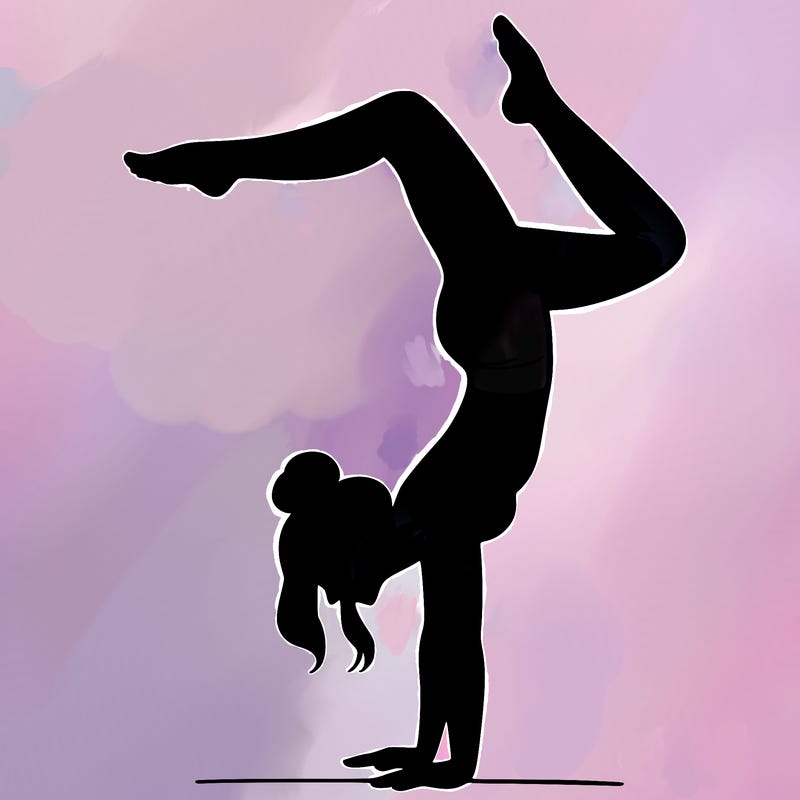 a woman doing a handstand