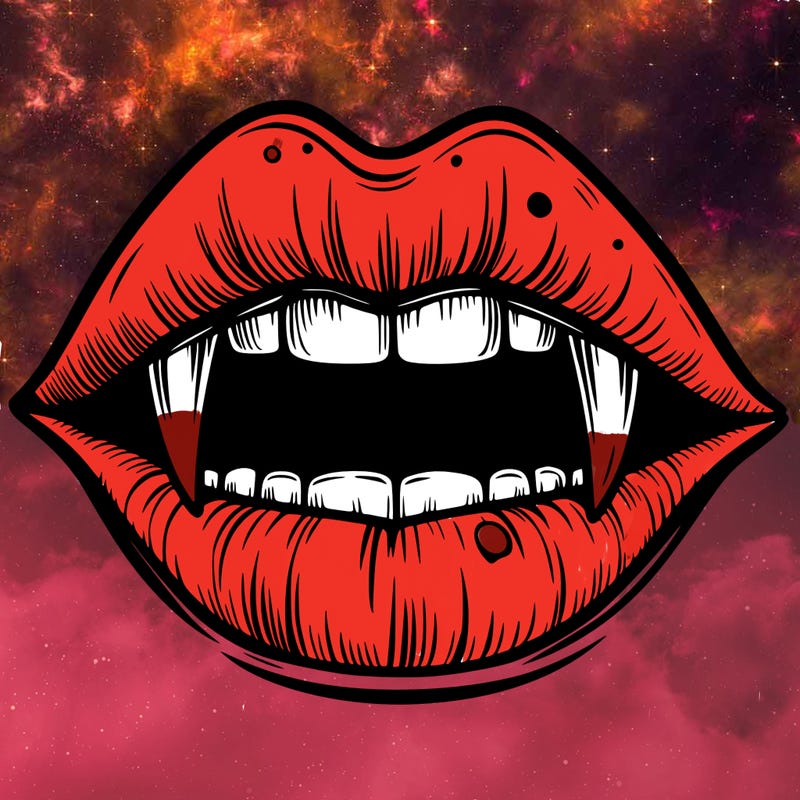 lips with vampire teeth