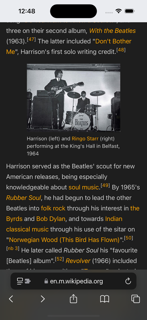 DarkReader Web - Un artículo de Wikipedia en un iPhone que muestra un tema de modo oscuro con texto claro y fondo negro