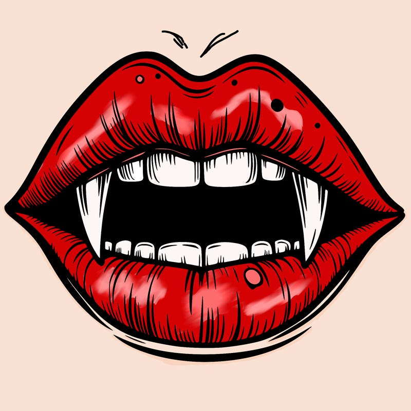 lips with vampire teeth