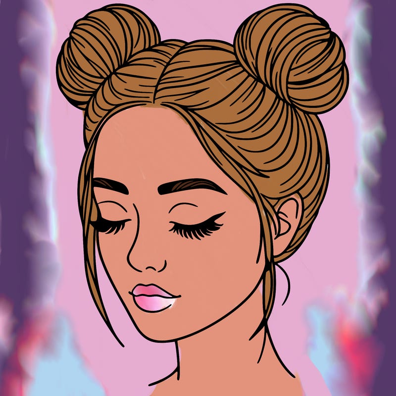 woman with hair buns