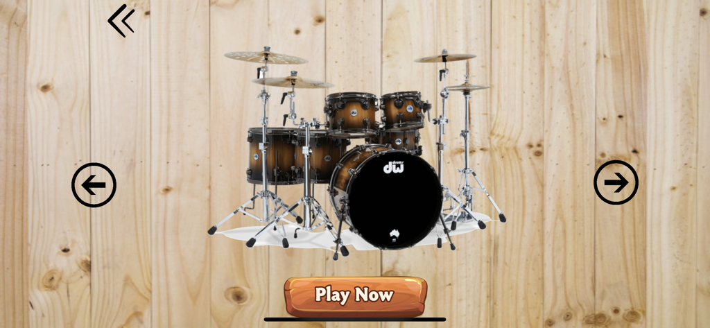 Tabla Drums Dhol Piano Guitar - A realistic virtual drum kit interface with a Play Now button on a wooden background.