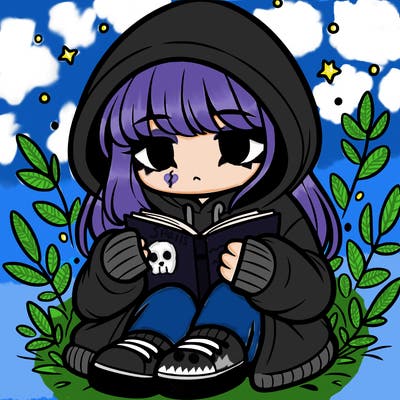 girl in oversized hoodie reading a book