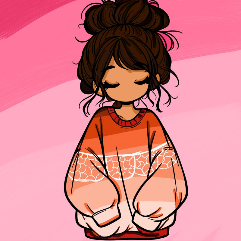 girl with baggy sweatshirt and messy bun