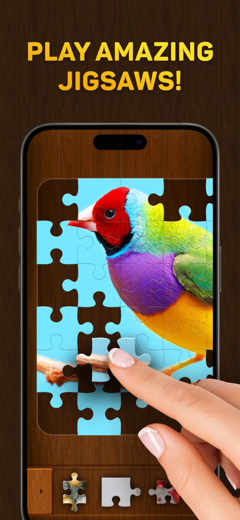 A person playing a colorful bird jigsaw puzzle on a mobile phone with a wooden background