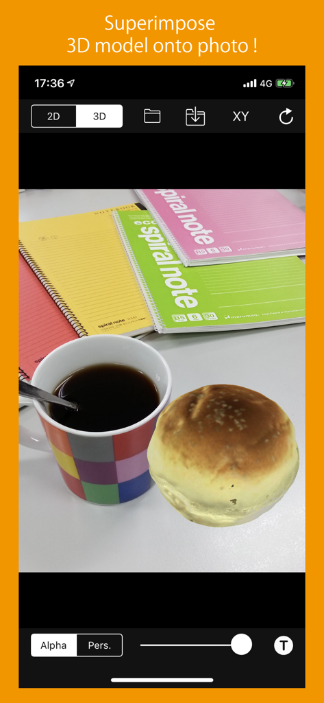 3D Superimpose - Screenshot of the 3D Superimpose app interface showing a 3D bread roll model placed on a photo of a coffee mug and notebooks.