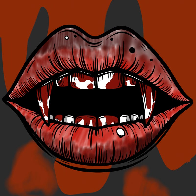lips with vampire teeth