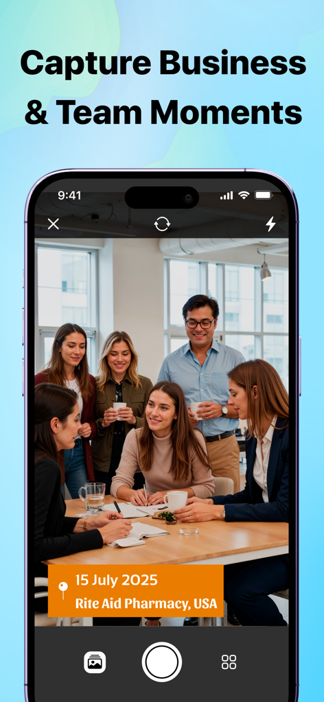 A group of office professionals in a photo with an orange date and location timestamp overlay