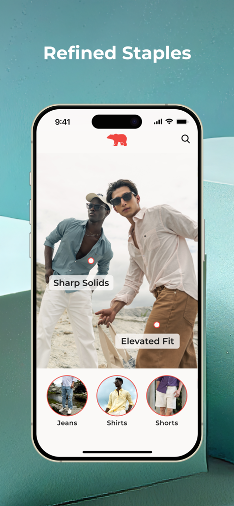 The Bear House mobile app home screen showcasing refined staples for men including sharp solid shirts and elevated fit clothing.