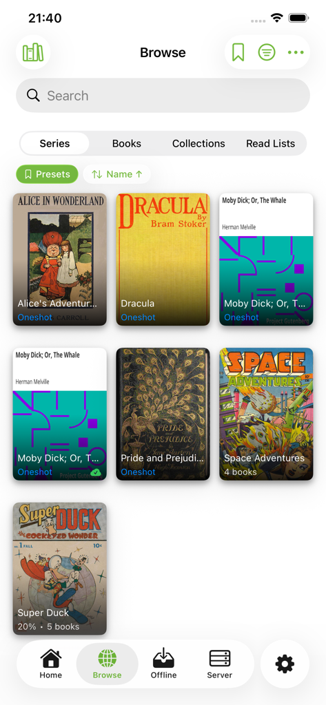 KMReader - Pantalla de exploración de la aplicación KMReader mostrando una cuadrícula de portadas de libros y series como Alicia en el País de las Maravillas y Drácula.