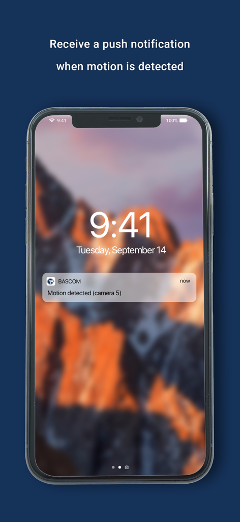 A smartphone lock screen displaying a Bascom app push notification for motion detection