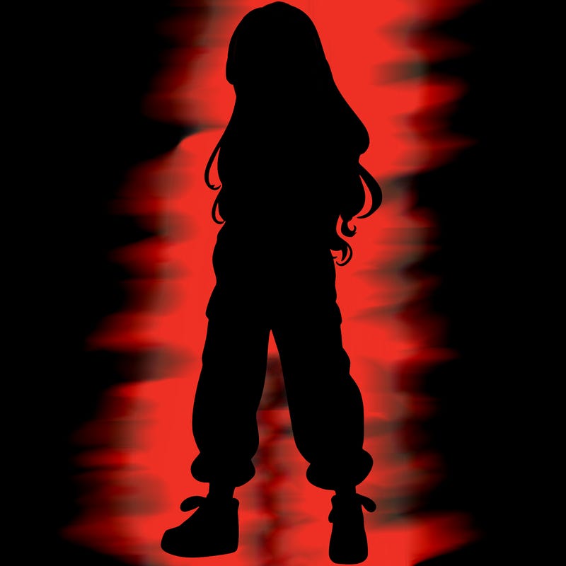 girl in baggy pants crop top and long hair