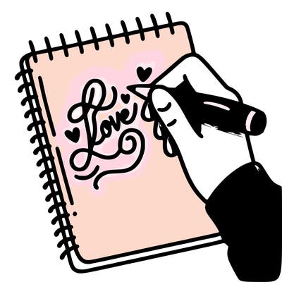 a hand writing “love” in calligraphy on a notebook