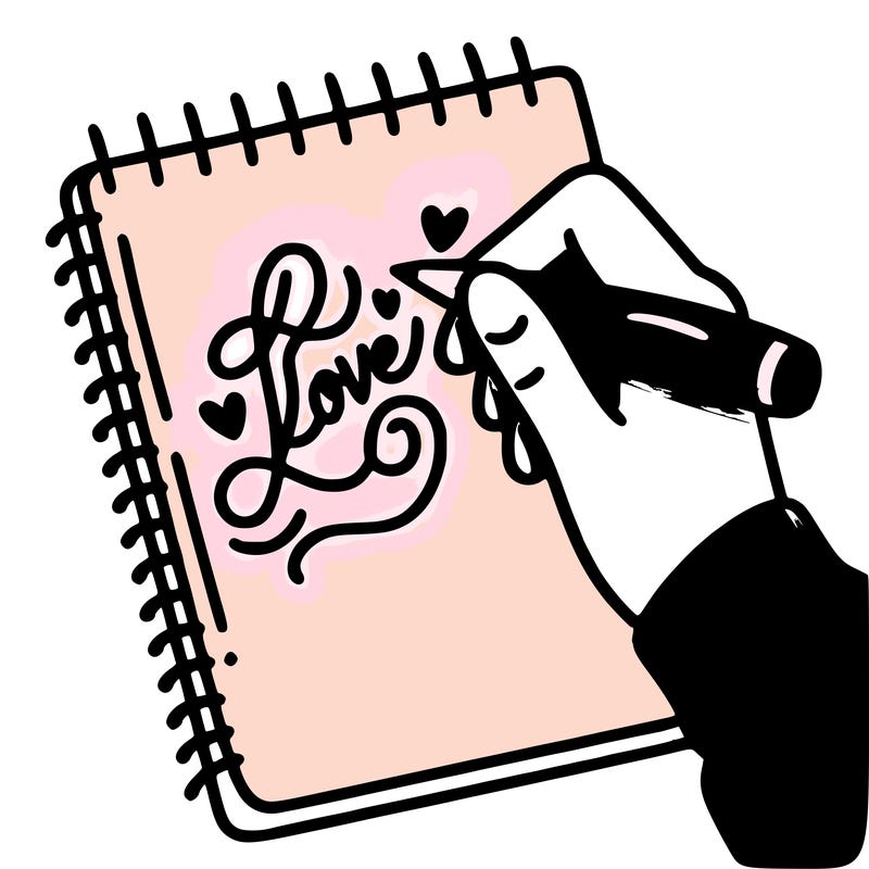 a hand writing “love” in calligraphy on a notebook