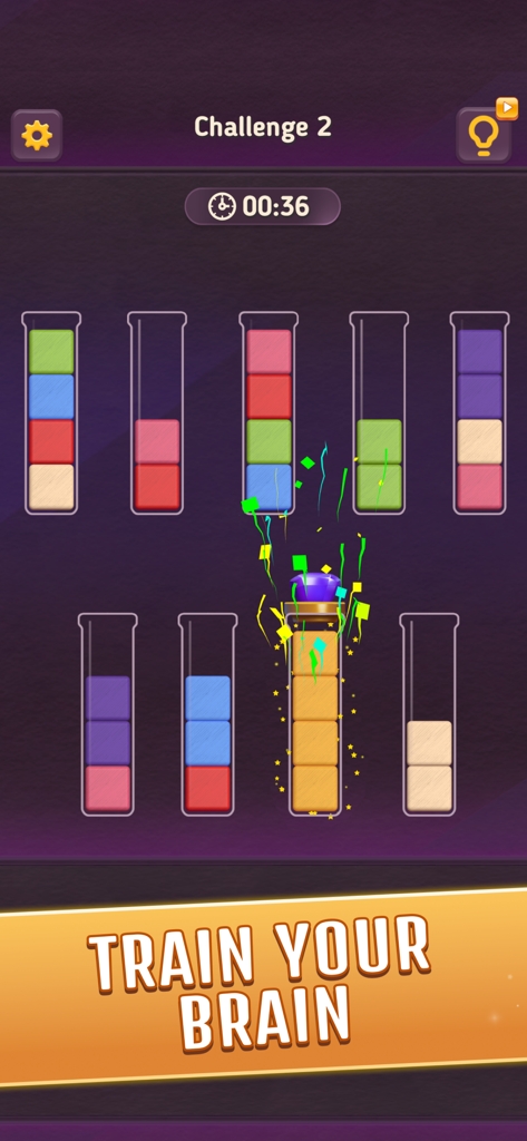 Block King Puzzle - A color sorting puzzle game screen showing glass tubes being filled with colored blocks and a banner that says Train Your Brain