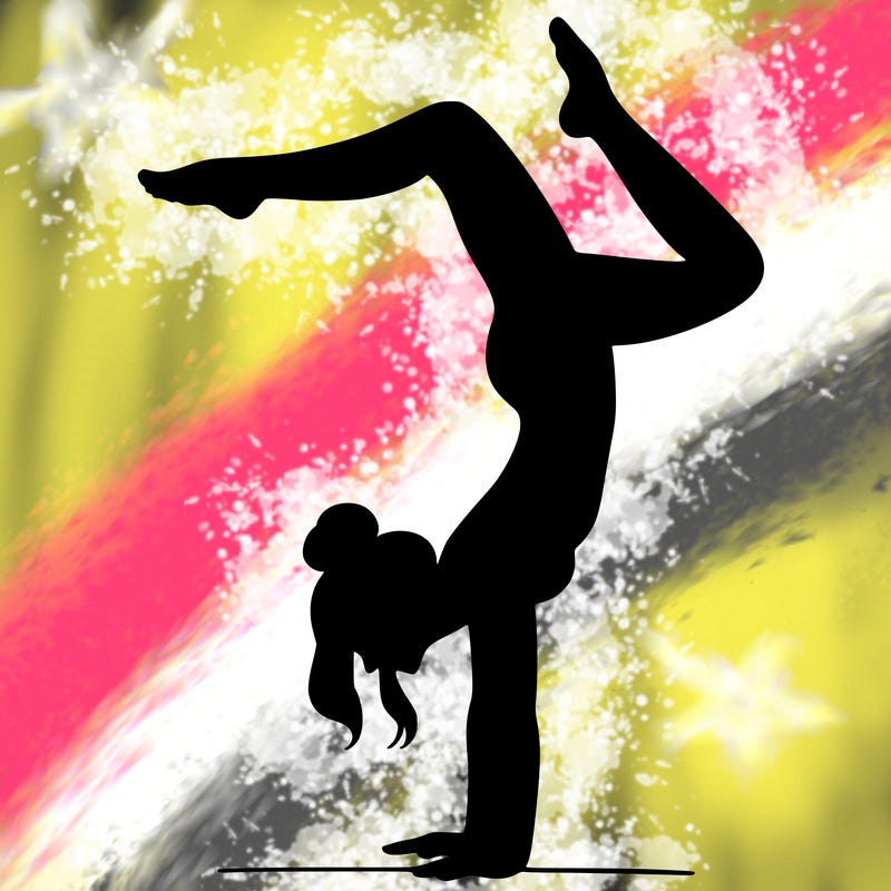 a woman doing a handstand