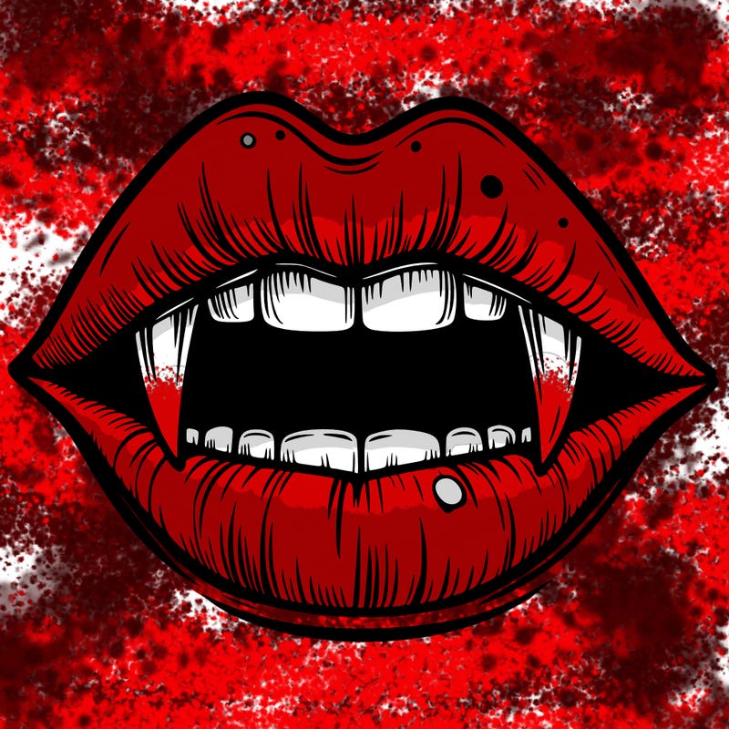 lips with vampire teeth