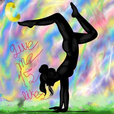 a woman doing a handstand