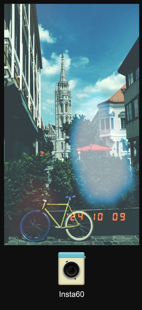 A vintage film style photo of a city street featuring a yellow bicycle and a light leak effect with an orange date stamp.